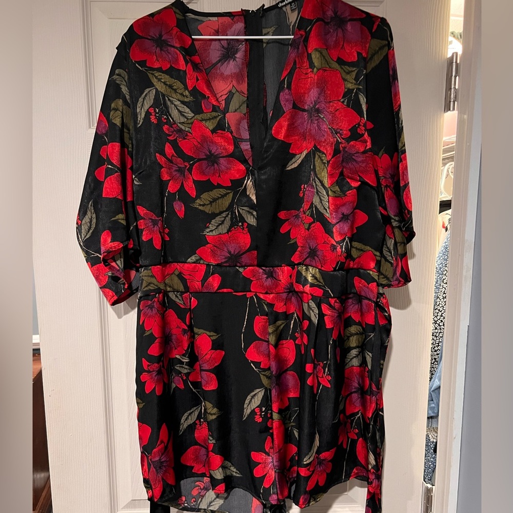 Silk flower print romper.